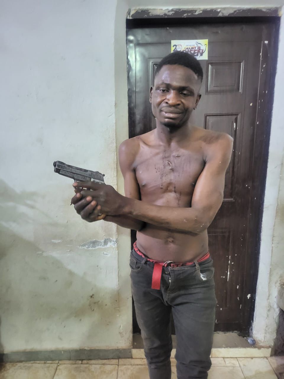 One of the arrested armed robbery suspects 
