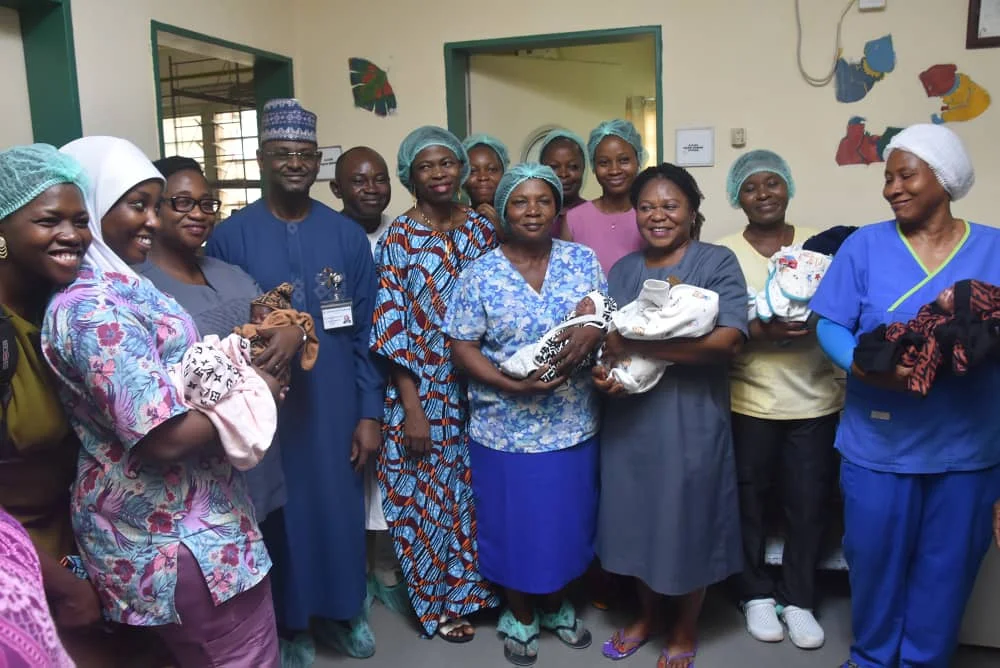 Abuja sextuplets discharged, hospital seeks support for them 1 The CMD, National Hospital, Prof. Muhammad Mahmud, the parents of the sextuplets, Mr Ifeanyi and Mrs Precious Nwachukwu and hospital staff with the sextuplets, on Thursday in Abuja