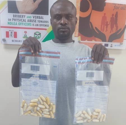 Choked by ingested drugs, India-bound passenger vomits, excretes 80 wraps of cocaine