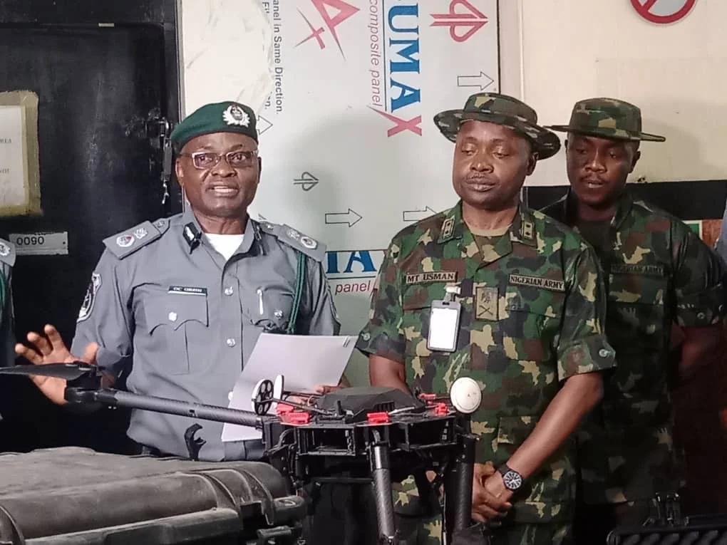The Customs Area Controller (CAC), Murtala Muhammed International Airport (MMIA), Comptroller. Charles Orbih, while handing over 112 military hardwares and accessories, two bullet proof helmets and two Army vests to General Officer commanding (GOC), 81 Division, Nigerian Army, Major General Muhammad Usman