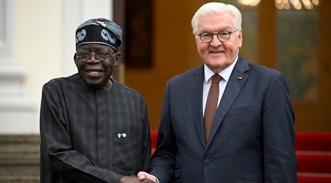 German President Frank Walter Steinmeier R shakes hands with the President of Nigeria Bola Ahmed Adekunle Tinubu as he arrives for a lunch at the presidential Bellevue Palace in Berlin
