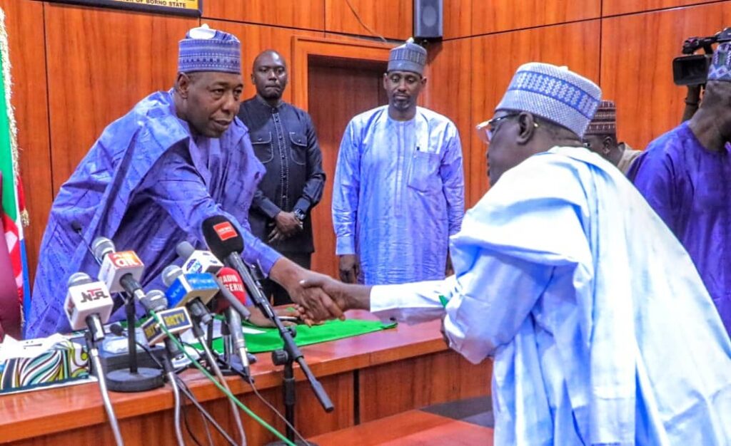 Zulum swears in head of service, harps on civil servants training 1 Borno State Governor, Babagana Umara Zulum (right) welcomes Dr. Mohammed Aminu Ghuluze, the newly appointed Head of the State's Civil Service (left), during the swearing-in ceremony in Maiduguri.