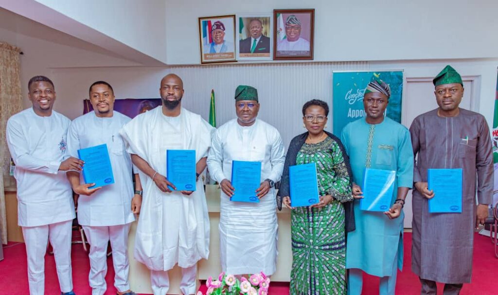 L-R: Manji Wilson, Chief Technical Adviser on Development Partnerships, Plateau State; Abuchi Peter Ugwu, CEO of Chocolate City Music; Audu Maikori, Chairman of Chocolate City Group; Hon. Cornelius Doeyok, Commissioner for Tourism, Culture, and Hospitality; Mrs. Dongkum Grace Shwarta, Commissioner for Finance; Hon. Musa Ibrahim Ashoms, Commissioner for Youth; and Hon. Sylvanus Dongtoe, Commissioner for Housing & Urban Development, at the creative sector partnership signing ceremony in Jos, Plateau State.
