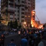 Israeli airstrikes hitting a building in Saadat Abad street in Tehran, Iran on Friday.Credit...