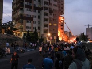 Israeli airstrikes hitting a building in Saadat Abad street in Tehran, Iran on Friday.Credit...