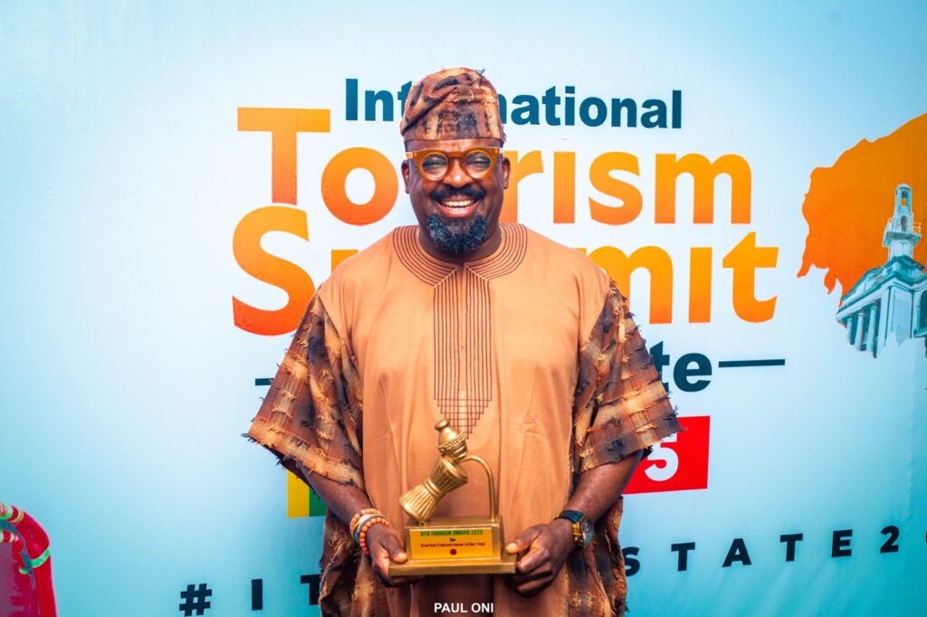 Kunle Afolayan bags Tourism Entrepreneur of the Year Award at Oyo international summit 1 Kunle Afolayan displayimg his Tourism Entrepreneur of the Year Award during the Oyo international summit