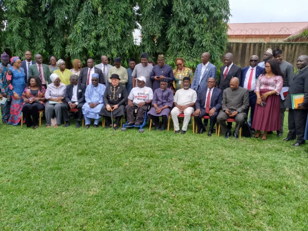 JAMB's Registrar, Prof. Ishaq Oloyede in a group photograph with the 23-member Special Committee On Examination Infraction on Monday in Abuja