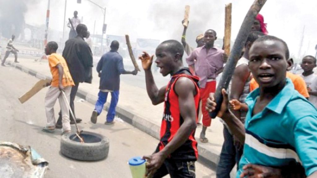 Mob set woman ablaze in Niger State for alleged blasphemy 1 Thugs, hoodlums mob