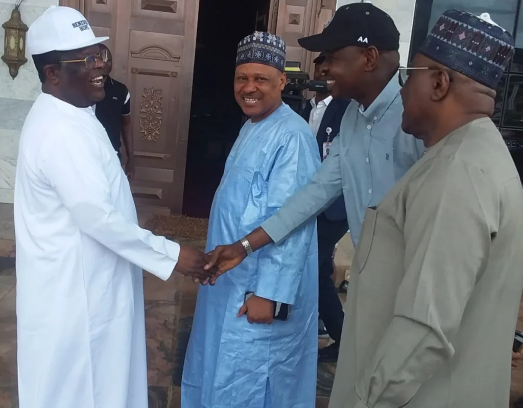 David Umahi, receiving the Minister of Information and National Orientation, Alhaji Mohammed Idris during a courtesy visit to him in Abakaliki on Saturday.