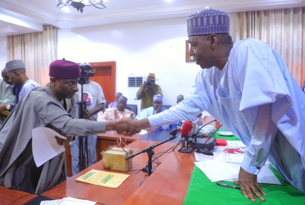 Zulum swears in 2 commissioners, judicial council member 1 Borno State Governor Babagana Zulum exchanging pleasantry with one of the newly inaugurated commissioners