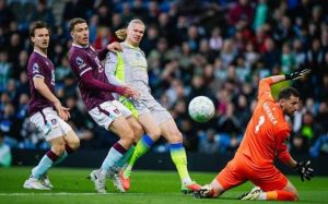 Haaland fires Manchester City level with Arsenal as Burnley relegation is sealed