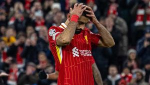 Mohamed Salah reacts after missing a penalty