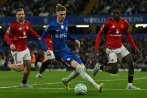 Chelsea’s English midfielder #10 Cole Palmer controls the ball during the English Premier League football match between Chelsea and Manchester United at Stamford Bridge in London on April 18, 2026. (Photograph: Glyn KIRK / AFP)