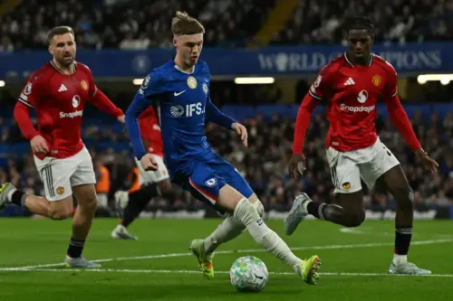 Chelsea’s English midfielder #10 Cole Palmer controls the ball during the English Premier League football match between Chelsea and Manchester United at Stamford Bridge in London on April 18, 2026. (Photograph: Glyn KIRK / AFP)