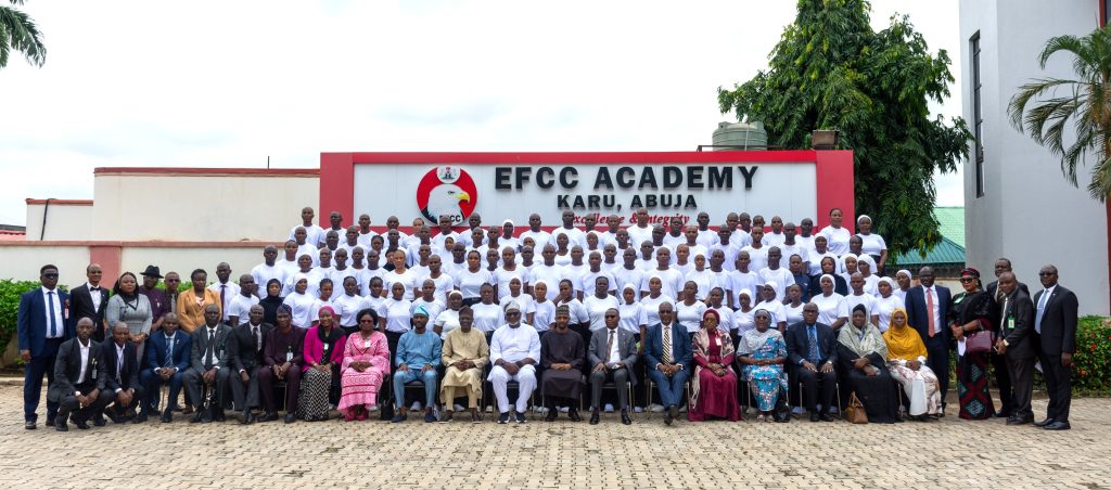 EFCC Academy flags off training of new Code of Conduct Bureau officers 1 EFCC Academy flags off training of new Code of Conduct Bureau officers Economic and Financial Crimes Commission (EFCC), has commenced a four-week Basic Investigation and Enforcement training for 102 newly recruited officers of the Code of Conduct Bureau, CCB. The Executive Chairman of the Commission, Ola Olukoyede speaking at the opening ceremony on Monday, August 10, 2026 at the EFCC Academy, Karu, Abuja, said “the programme marked a significant milestone in the history of the two institutions, this is the first time the EFCC is hosting and training newly recruited staff of the Code of Conduct Bureau”. The training is aimed at strengthening the investigative capacity, professionalism, discipline and ethical conduct of the newly recruited officers. Olukoyede, represented by the Acting Commandant, EFCC Academy, Assistant Commander of EFCC, ACE1 Joseph Ogwiji emphasized that the partnership “represents more than a training arrangement, it is a new chapter in institutional collaboration and capacity development” Chairman of the Code of Conduct Bureau, Dr. Abdullahi Usman Bello, in his address said “the partnership between our two institutions remains essential to the Nigerian Government’s efforts to promote integrity and ethical conduct in public service”. Bello charged the trainees to approach the training with all the seriousness it deserves because it is to prepare them to carry out the constitutional mandate of the Bureau which is to promote transparency, prevent conflict of interest and help build the public service that Nigerians can trust. The trainees were also urged to uphold integrity, discipline, professionalism, confidentiality and strict adherence to the law in the discharge of their responsibilities.